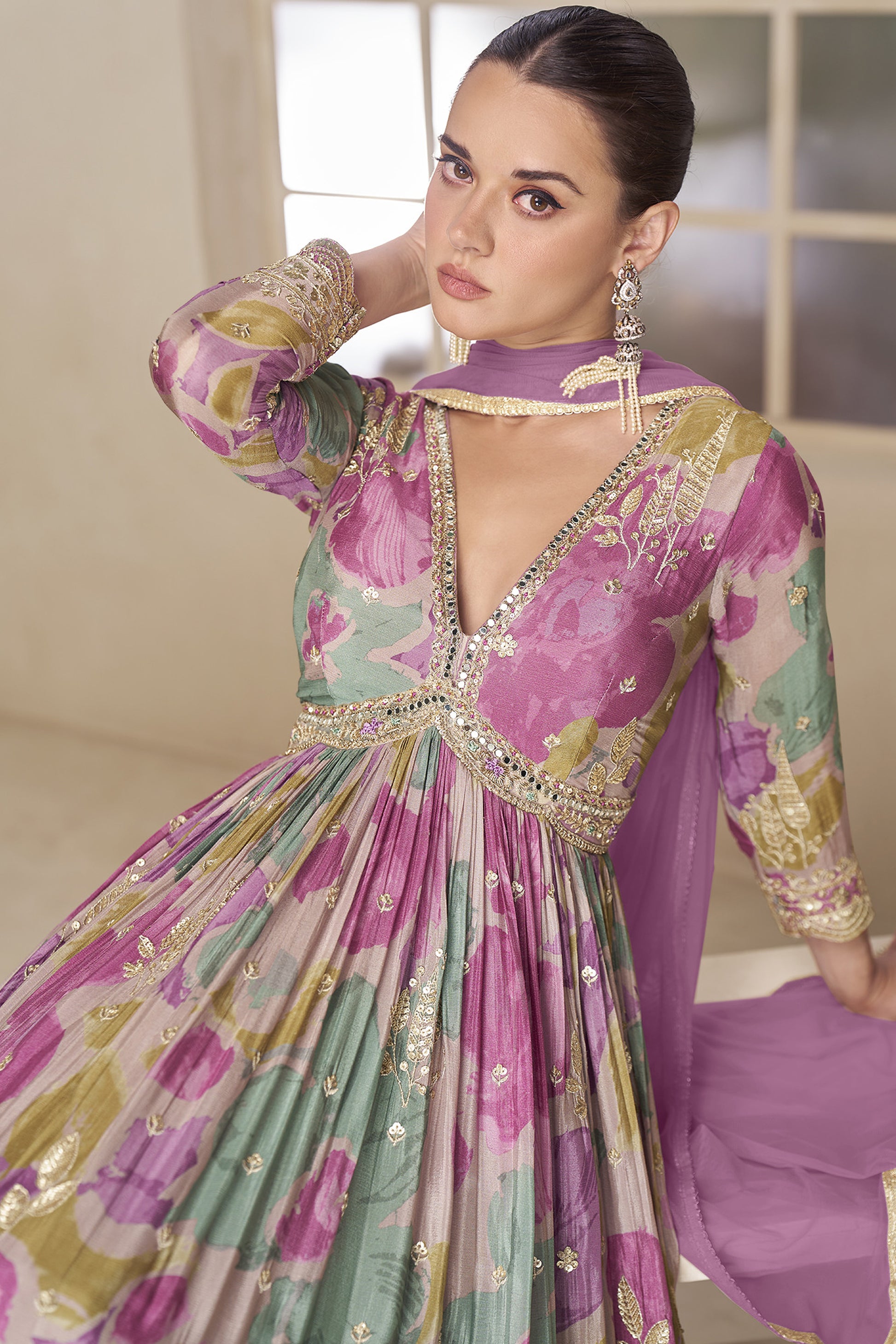 Lavender anarkali suit with heavy embroidery and flowing silhouette