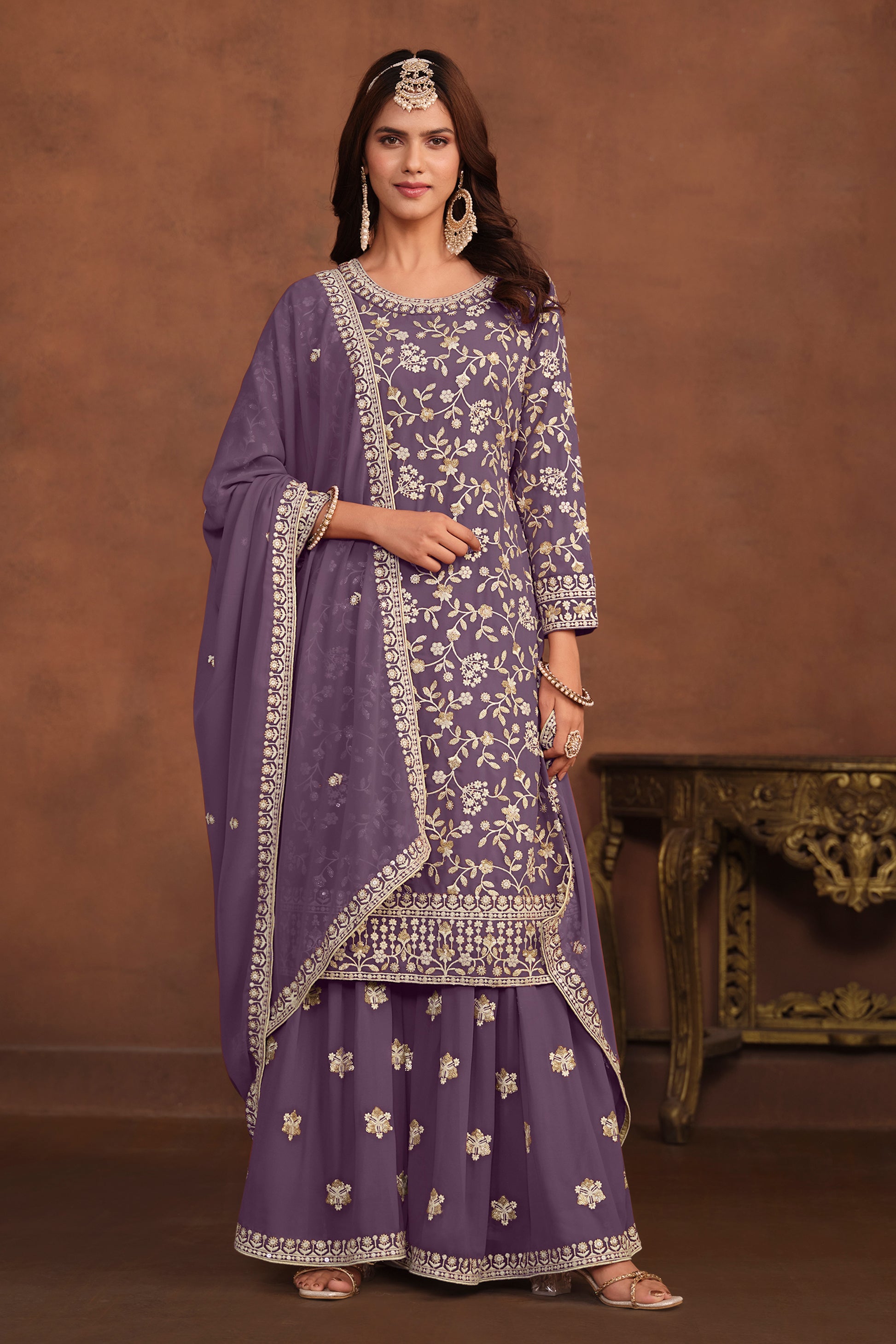 Front view of lavender designer party suit with embroidered kameez