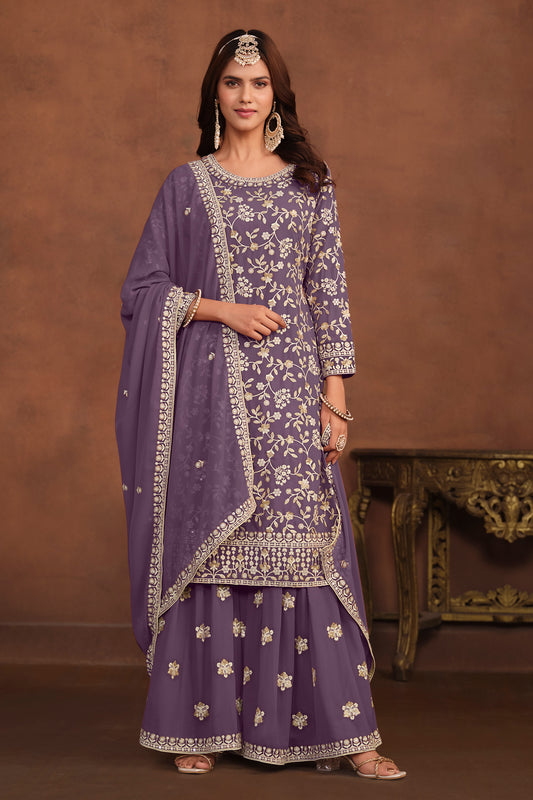 Front view of lavender designer party suit with embroidered kameez