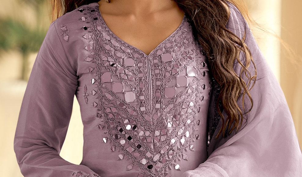 Indian plazzo suit in lavender with embroidery and mirror work