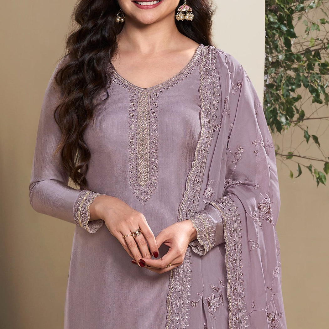 Detailed sleeve embroidery on lavender silk salwar kameez