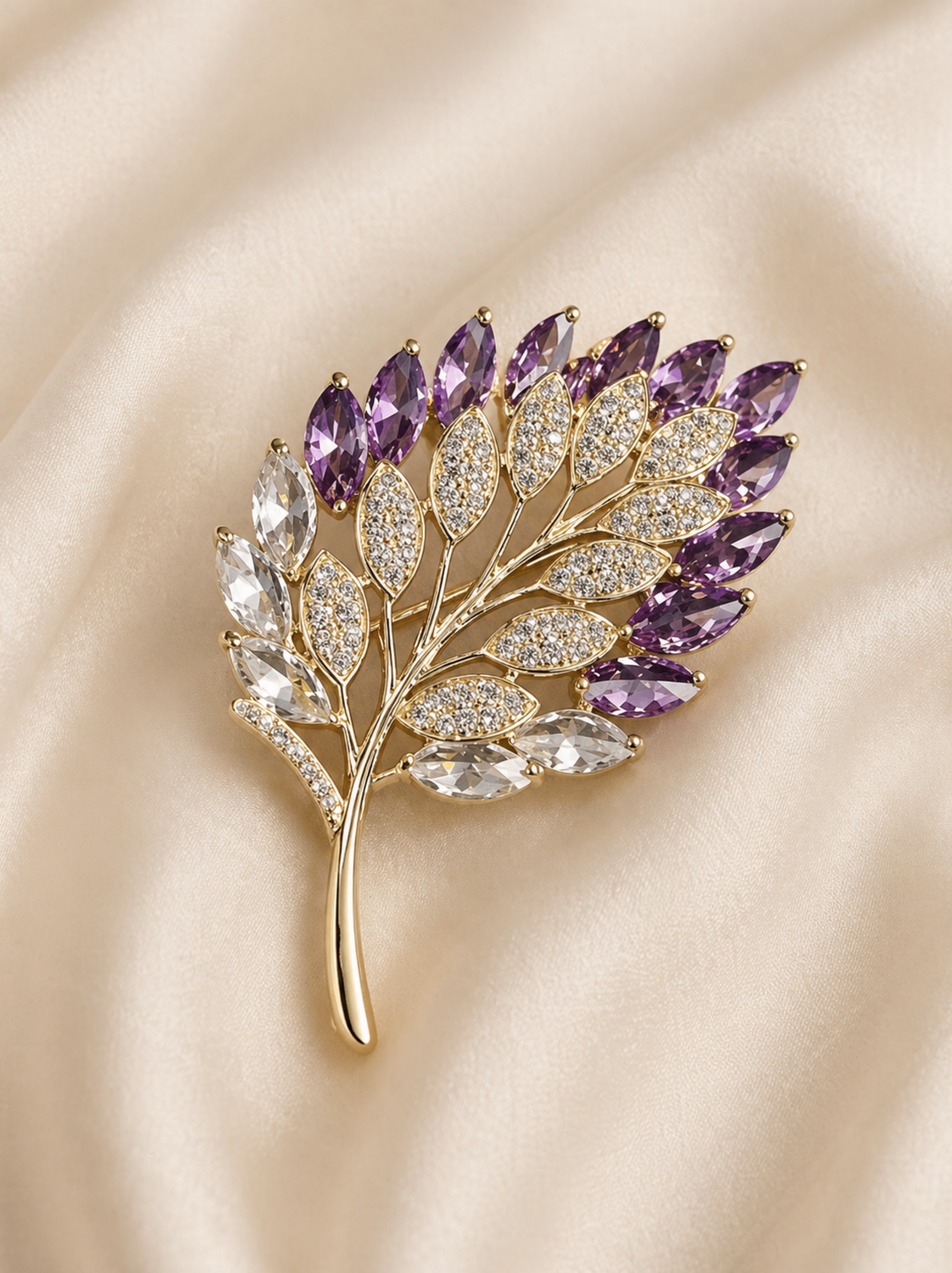 elegant leaf shaped brooch with structured design