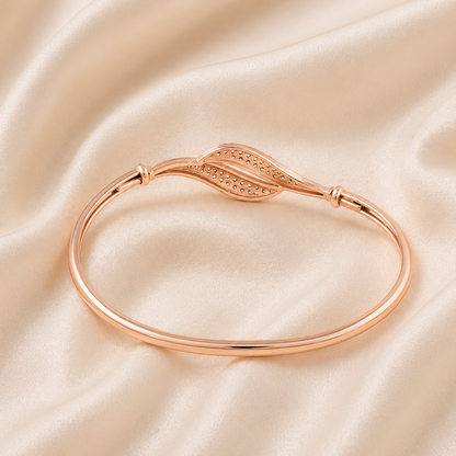 minimalist cuff bracelet with polished rose tone finish