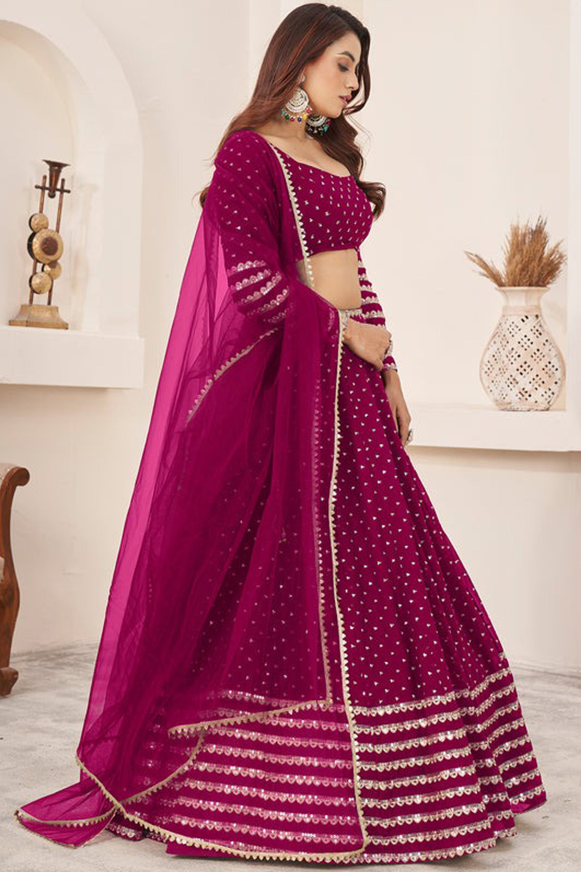 Back view of lehenga choli with dupatta drape