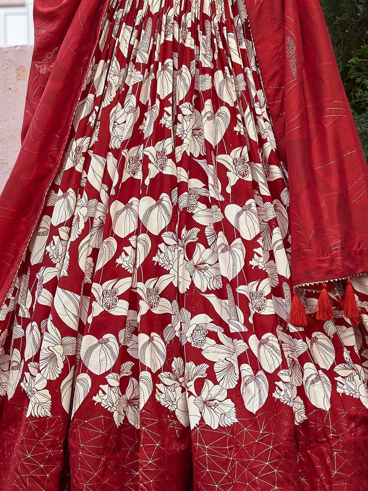 Waistband tassel accents on red reception lehenga