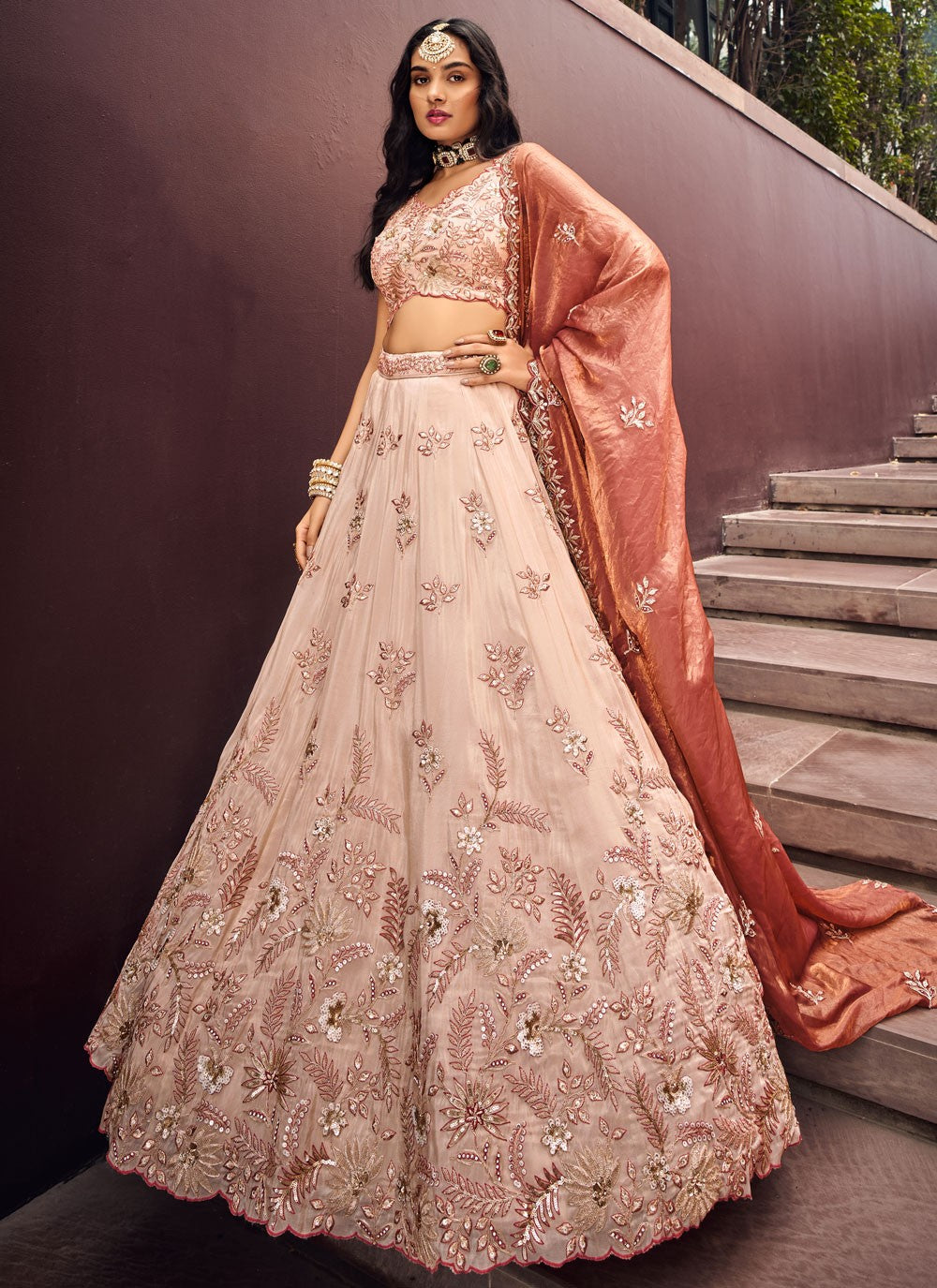 Sequins embroidery detail on net lehenga surface