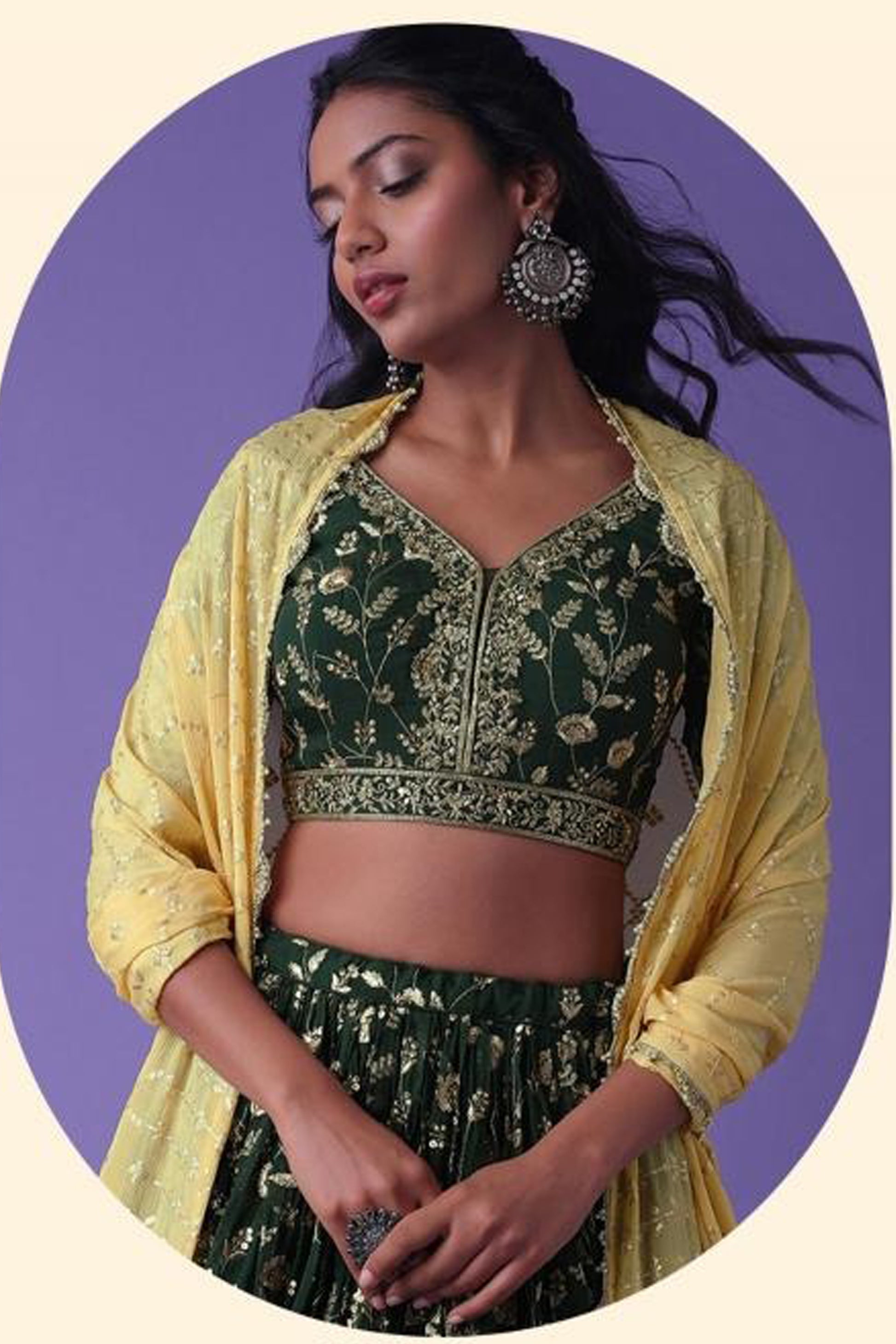 close-up of zari and sequins embroidery on green lehenga