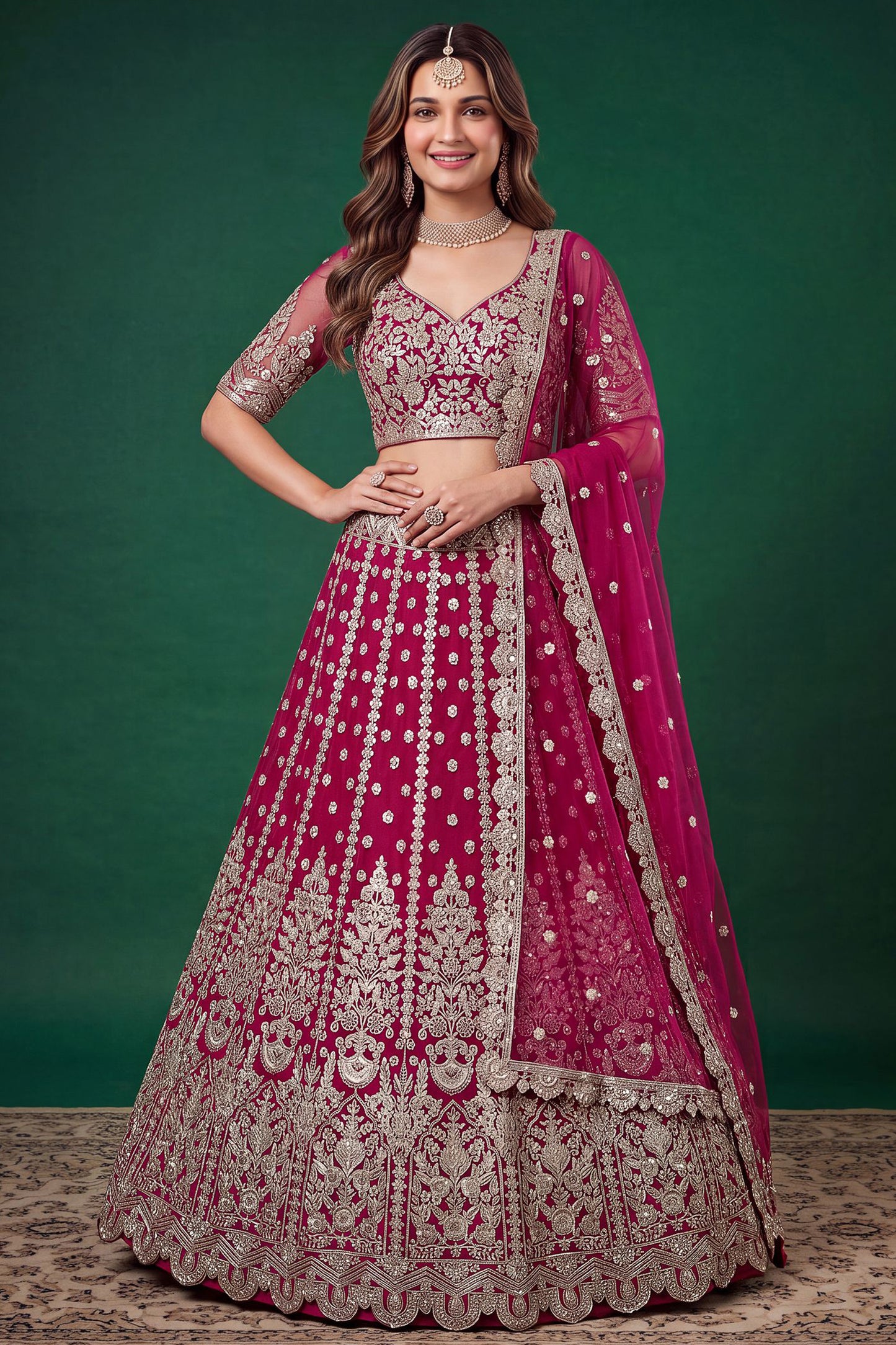 Pink lehenga choli in front view with detailed embroidery