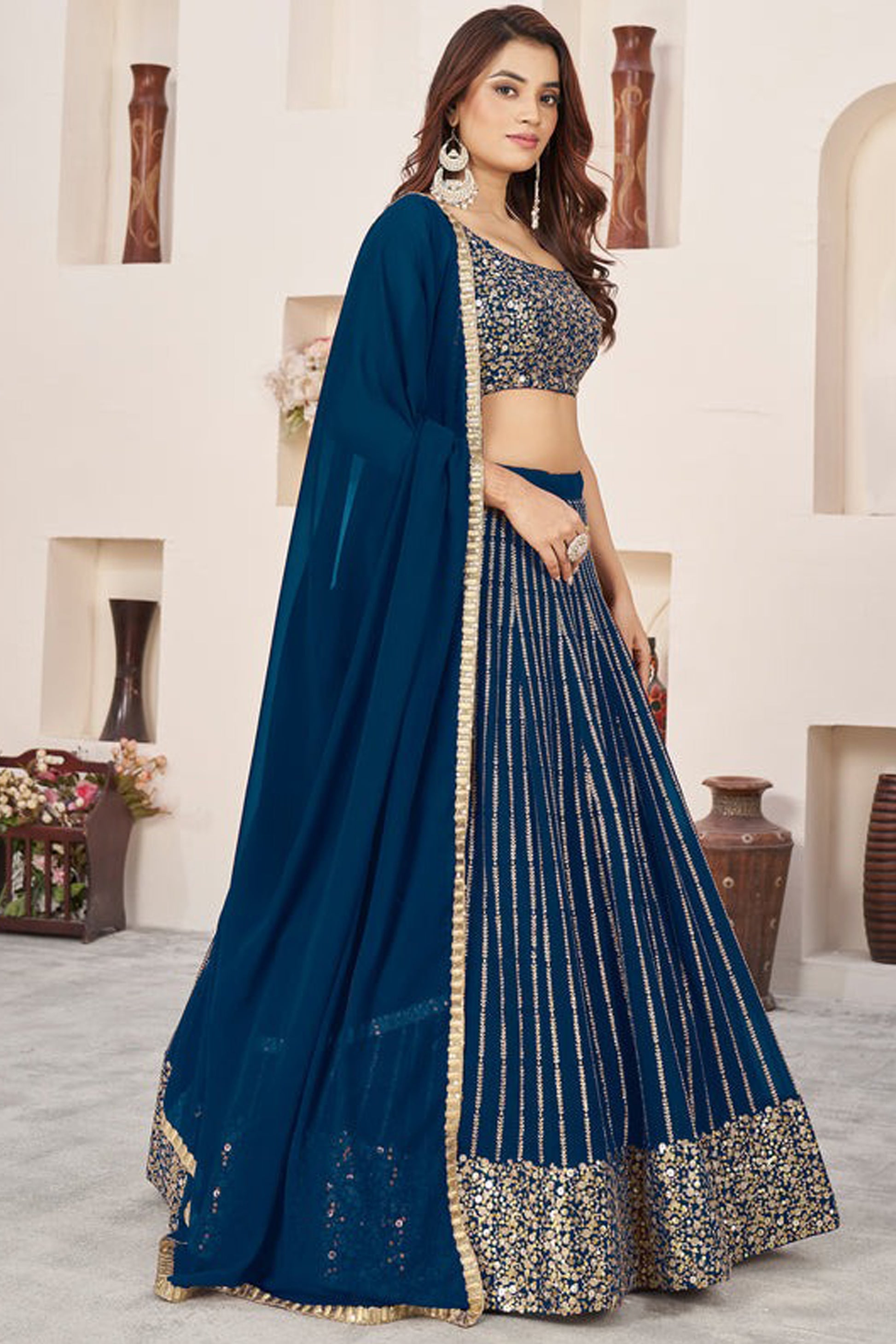 Reception wear ladies lehenga choli navy blue side view