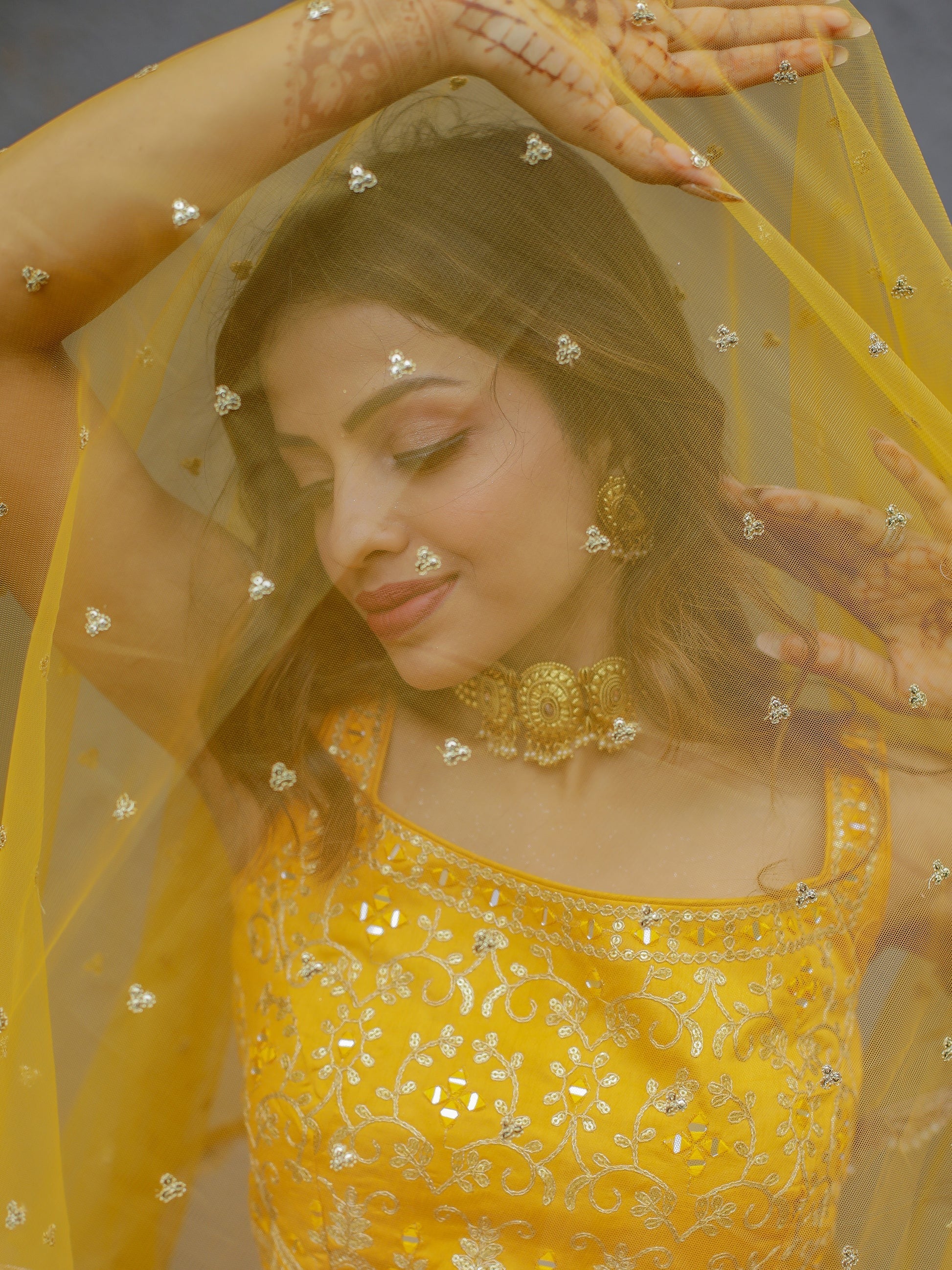 Close up embroidery work on yellow Dupatta fabric