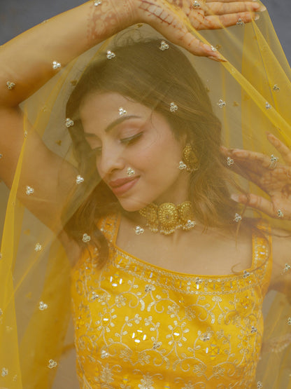 Close up embroidery work on yellow Dupatta fabric