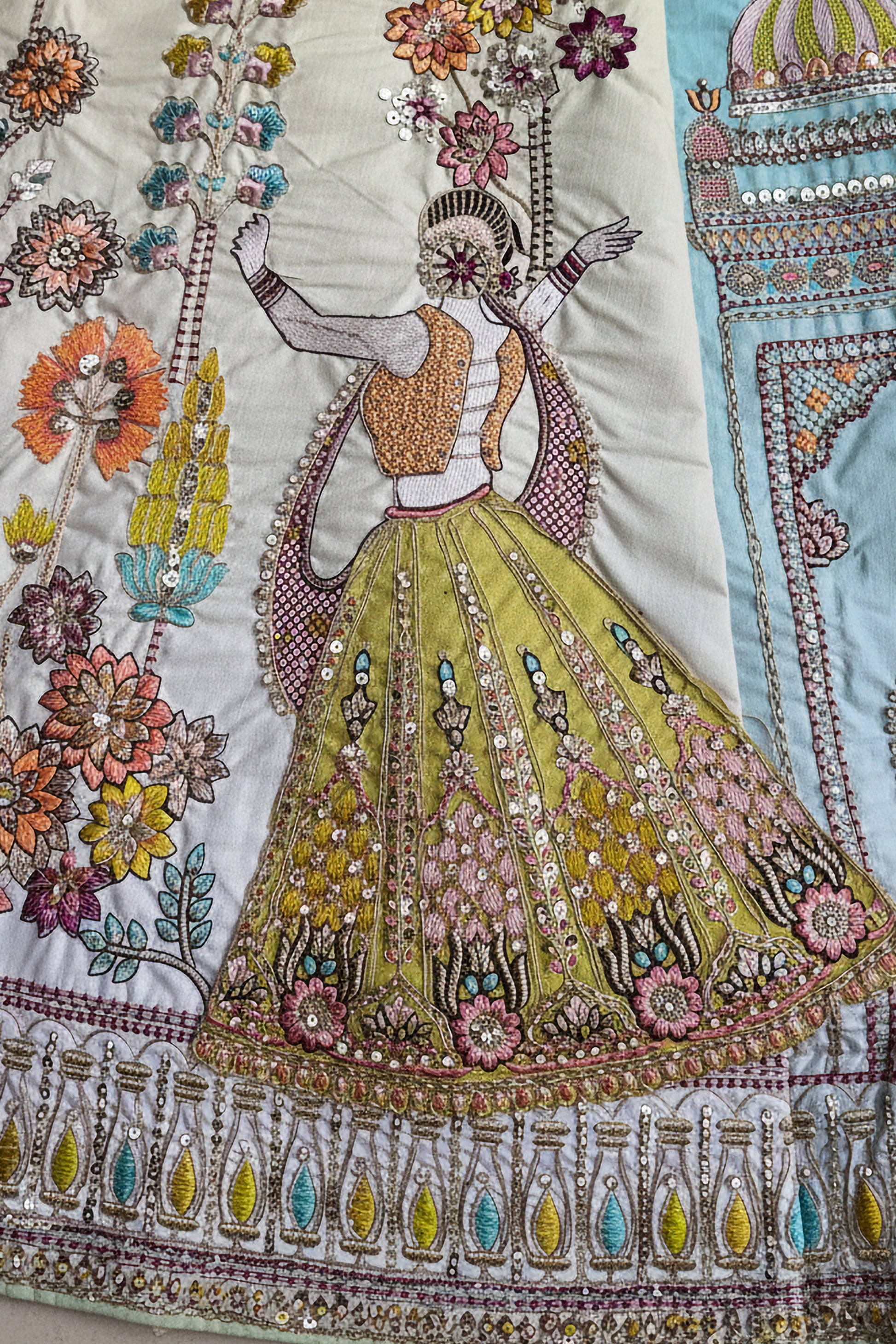Detailed shot of lace border on lehenga hemline