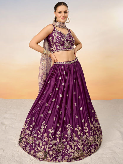 Detailed texture of thread embroidery on choli fabric