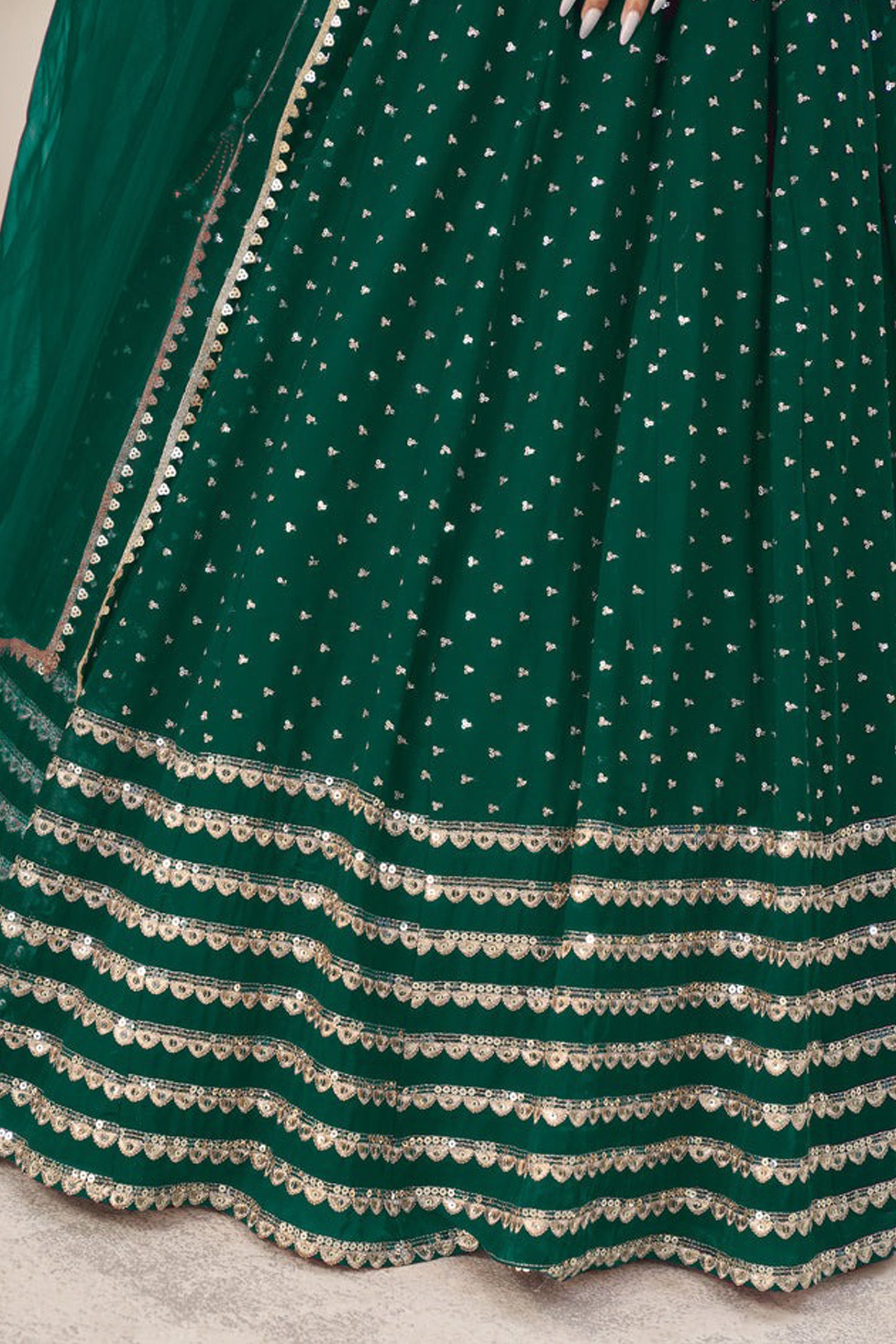 Engagement wear dark green lehenga choli with sequin detailing