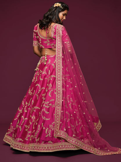 Pink bridal ghagra hemline with intricate zari accents