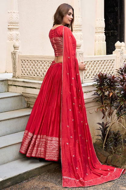 Side angle of red lehenga choli with woven design