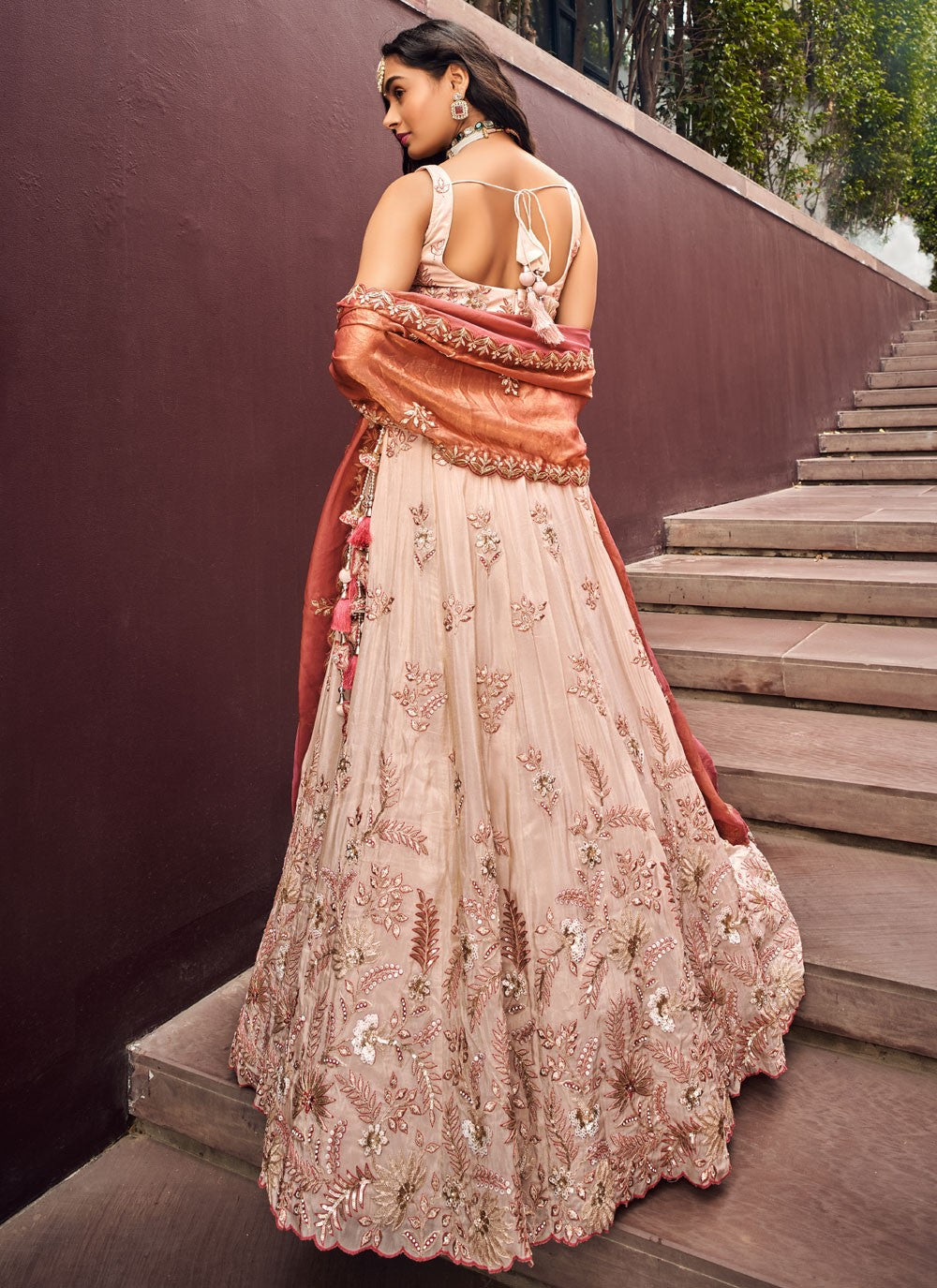 Back view of lehenga choli with embroidered blouse