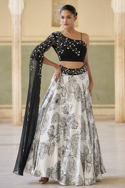 lehengas in black colour full front view with printed foil design