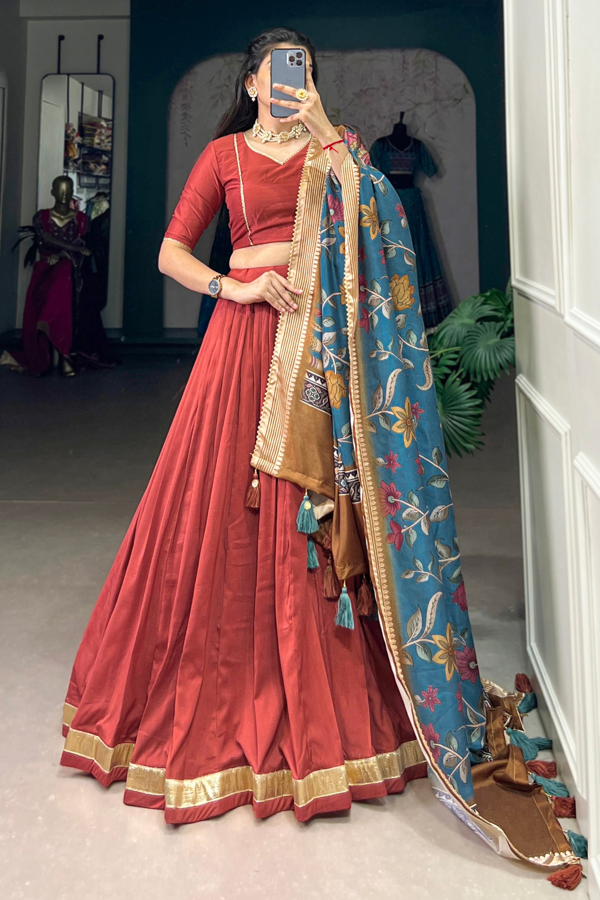 Lehengas in black colour inspired orange lehenga front view