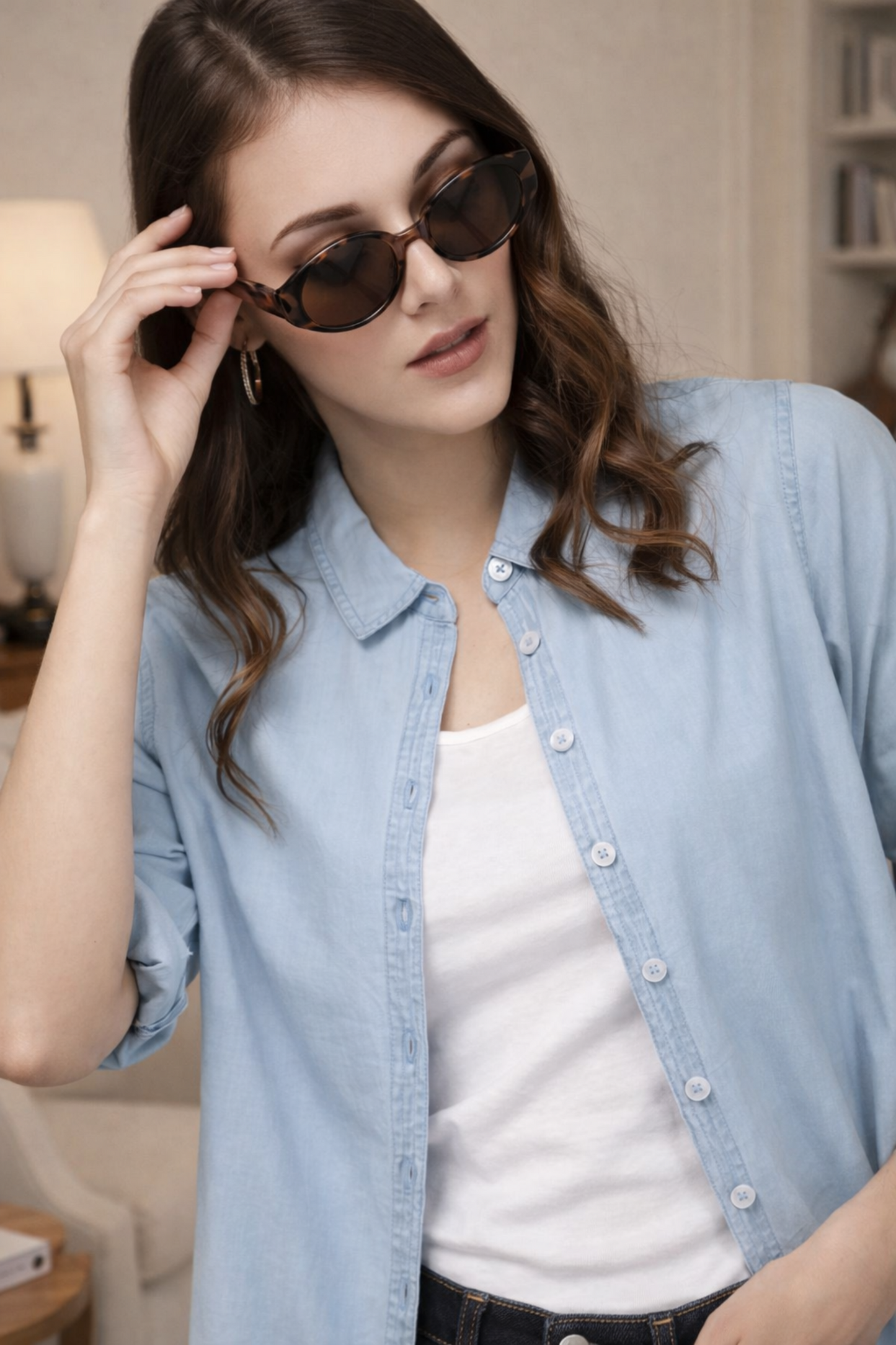 Close up of cotton fabric texture in cyan blue shirt