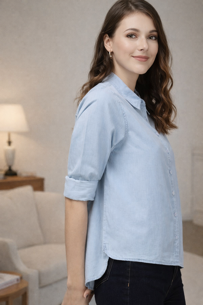 Side profile of cyan blue cotton shirt on model