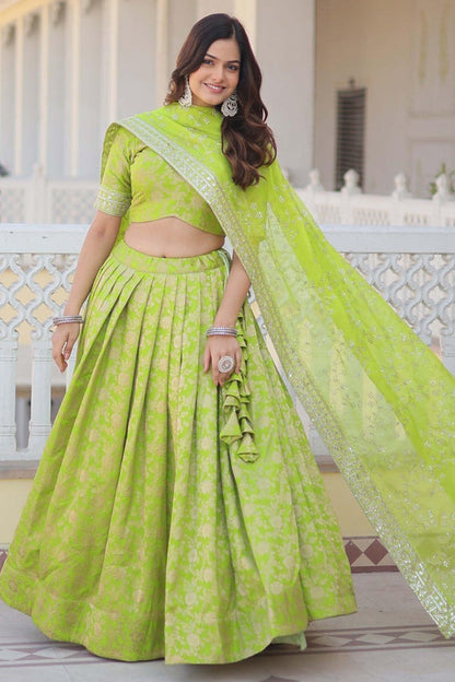 green lehenga back design with detailed work