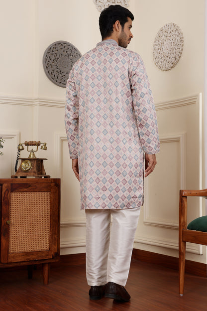 Light pink kurta for men styled as a kurta pajama set