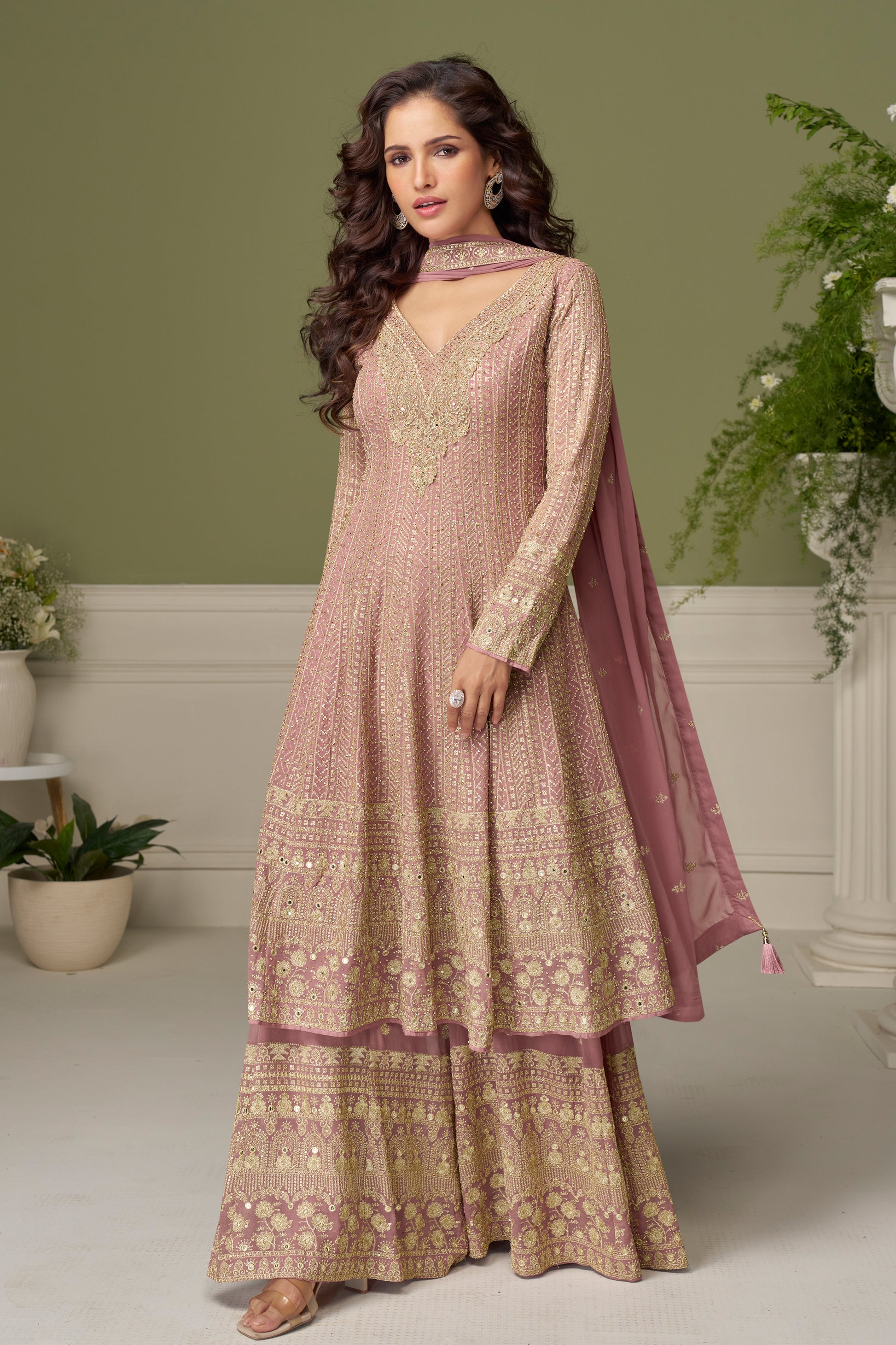 flowing silhouette of light pink palazzo pants side view