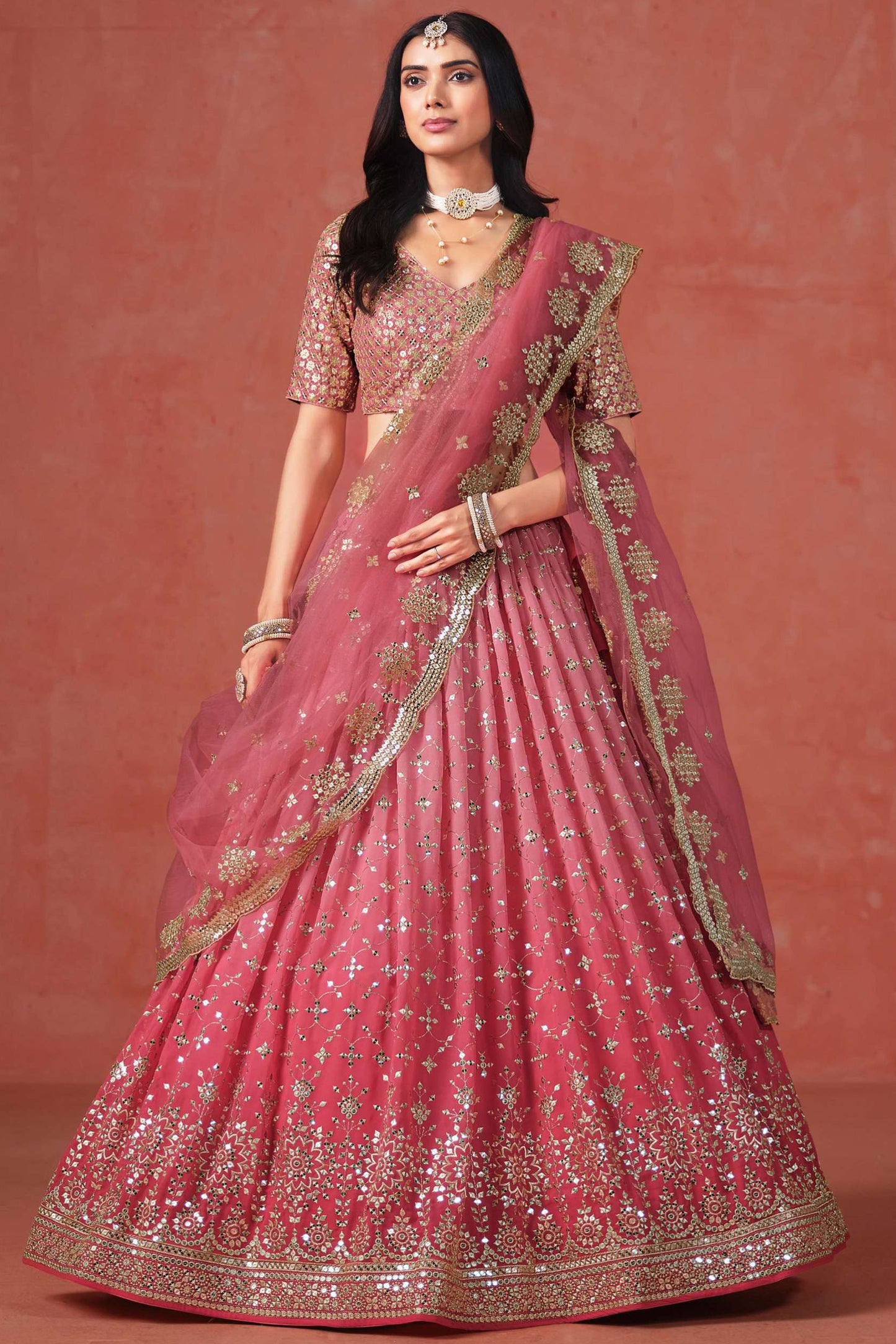 Light pink lehenga for wedding reception styling look