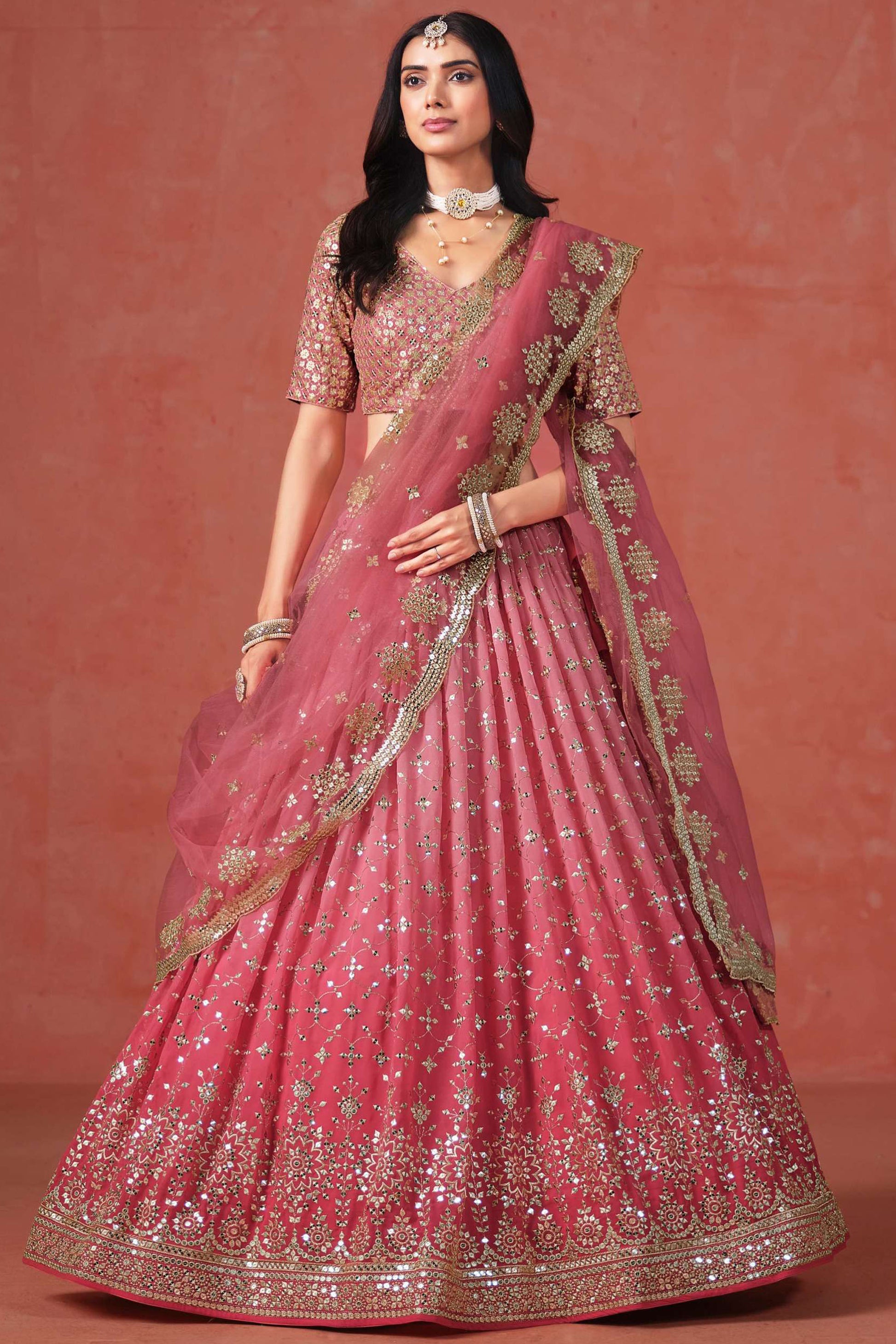 Light pink lehenga for wedding reception styling look