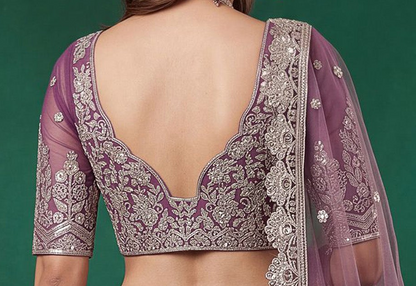 Back view of light purple lehenga choli with matching dupatta