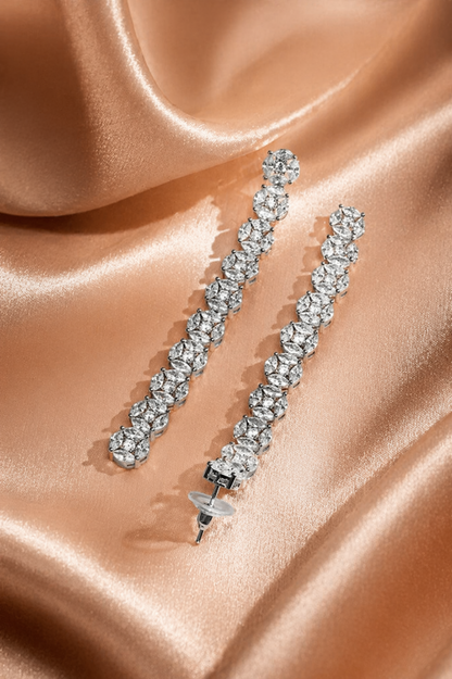 elegant diamond earrings worn on model