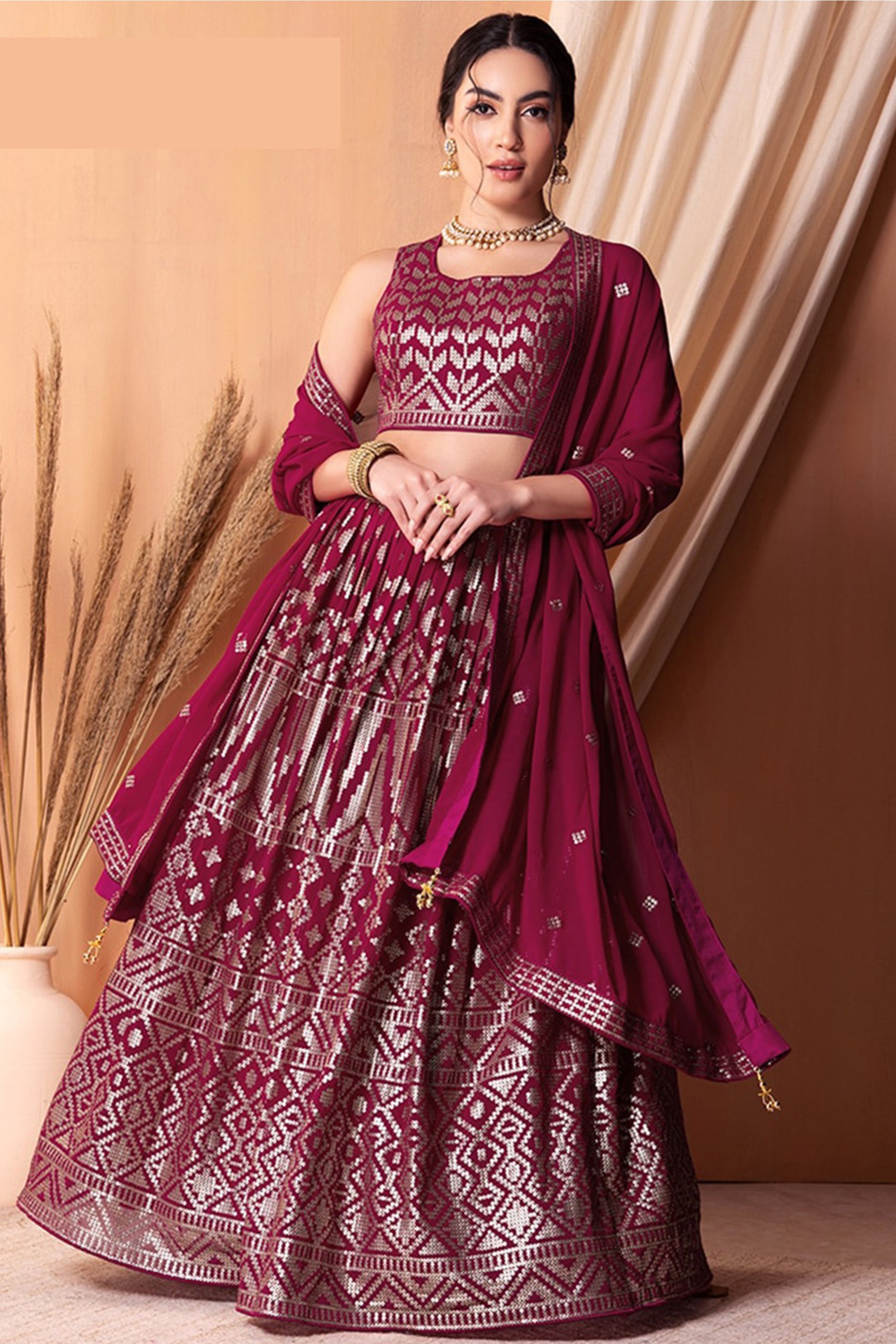 Wedding reception lehenga choli in maroon georgette fabric
