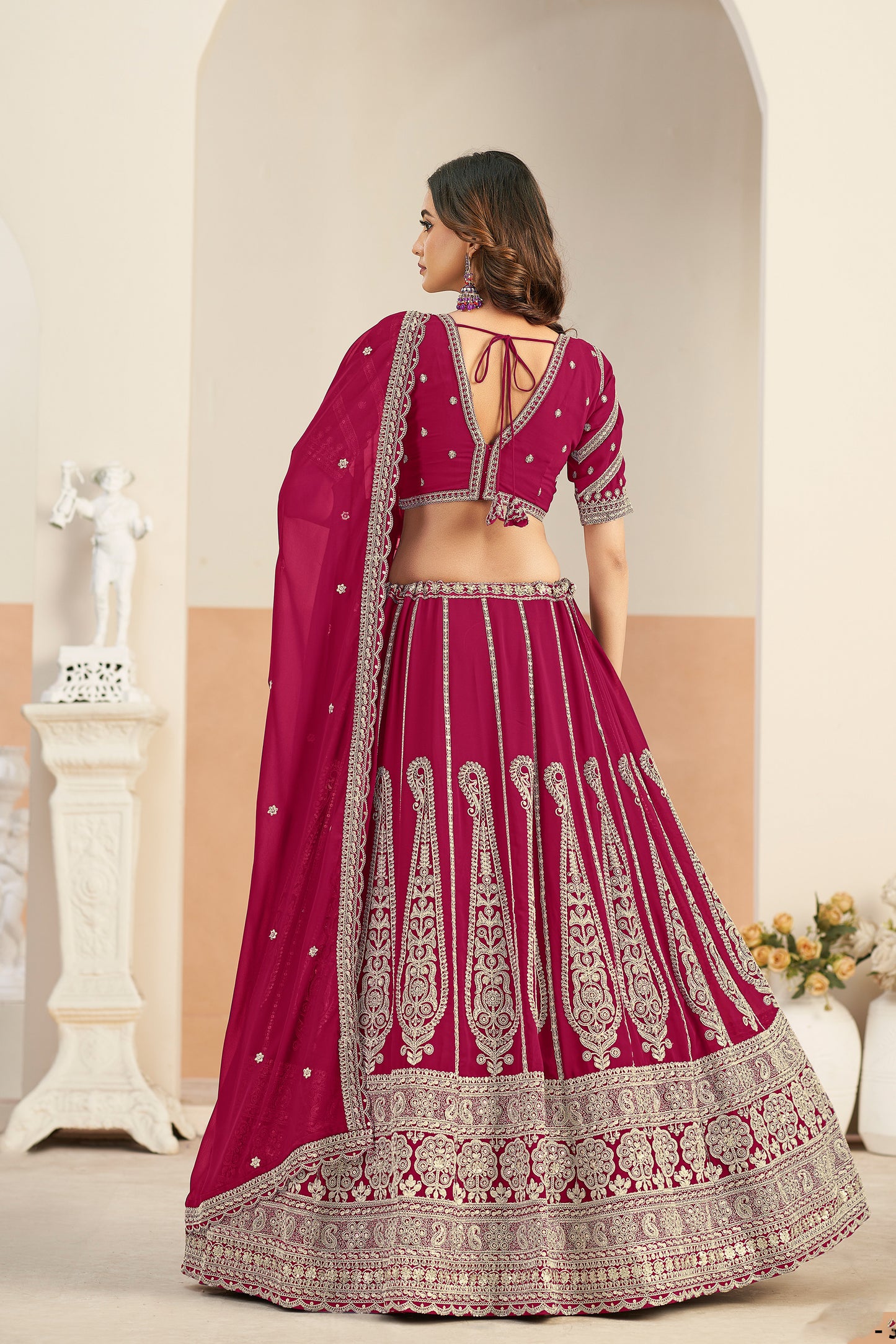 Maroon festive lehenga front and side 