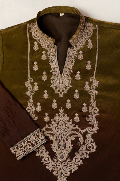 Detail view of embroidered work on the mehndi green kurta