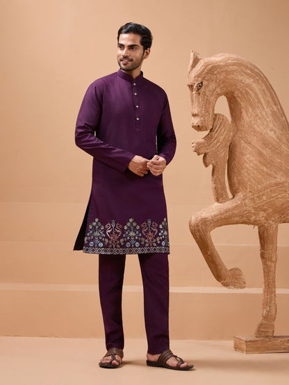 men’s wine kurta set showcasing rich wine tone and ethnic detailing
