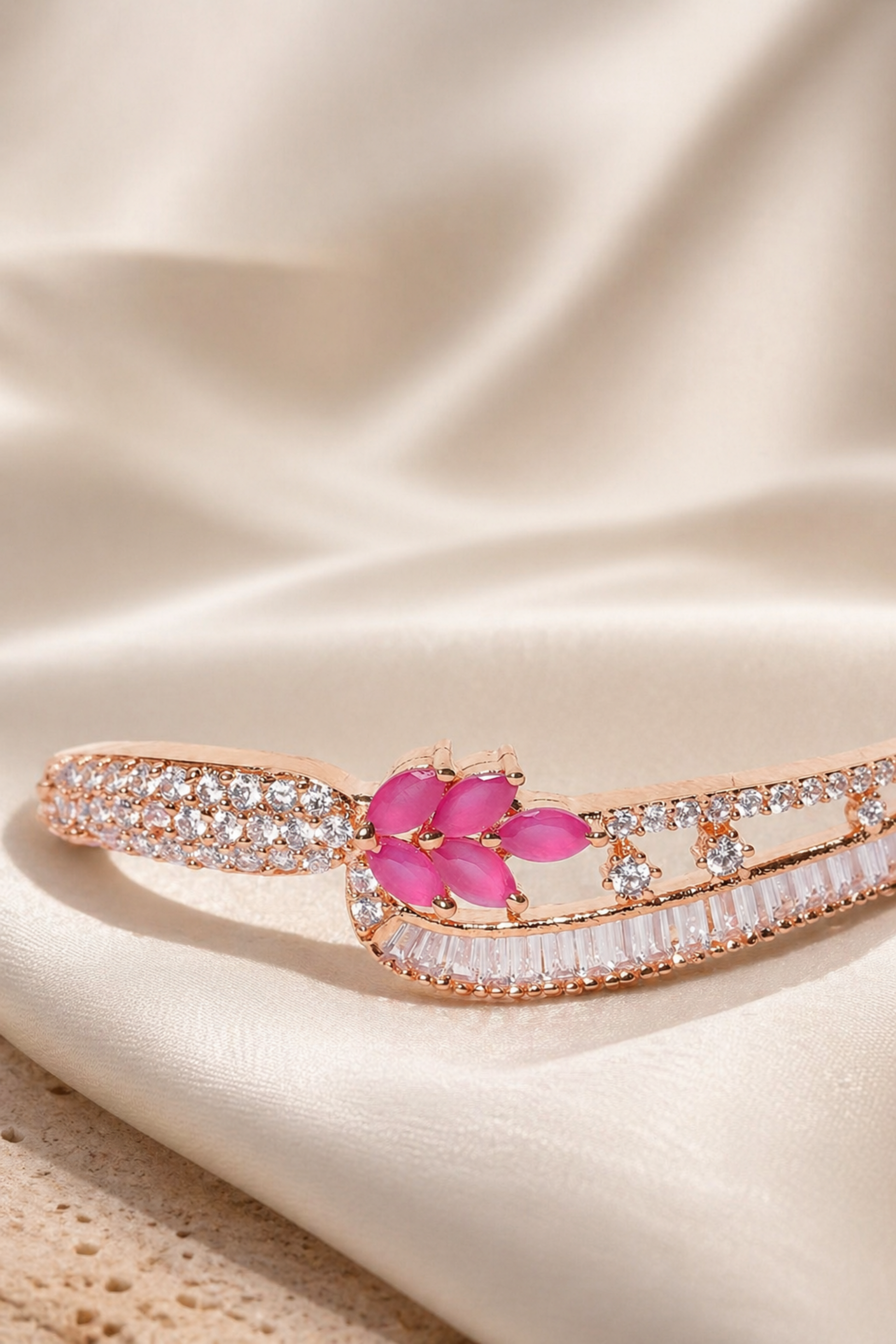 minimal rose gold bracelet on neutral background