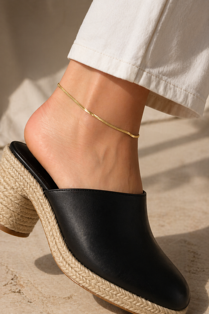 gold anklet styled with heels
