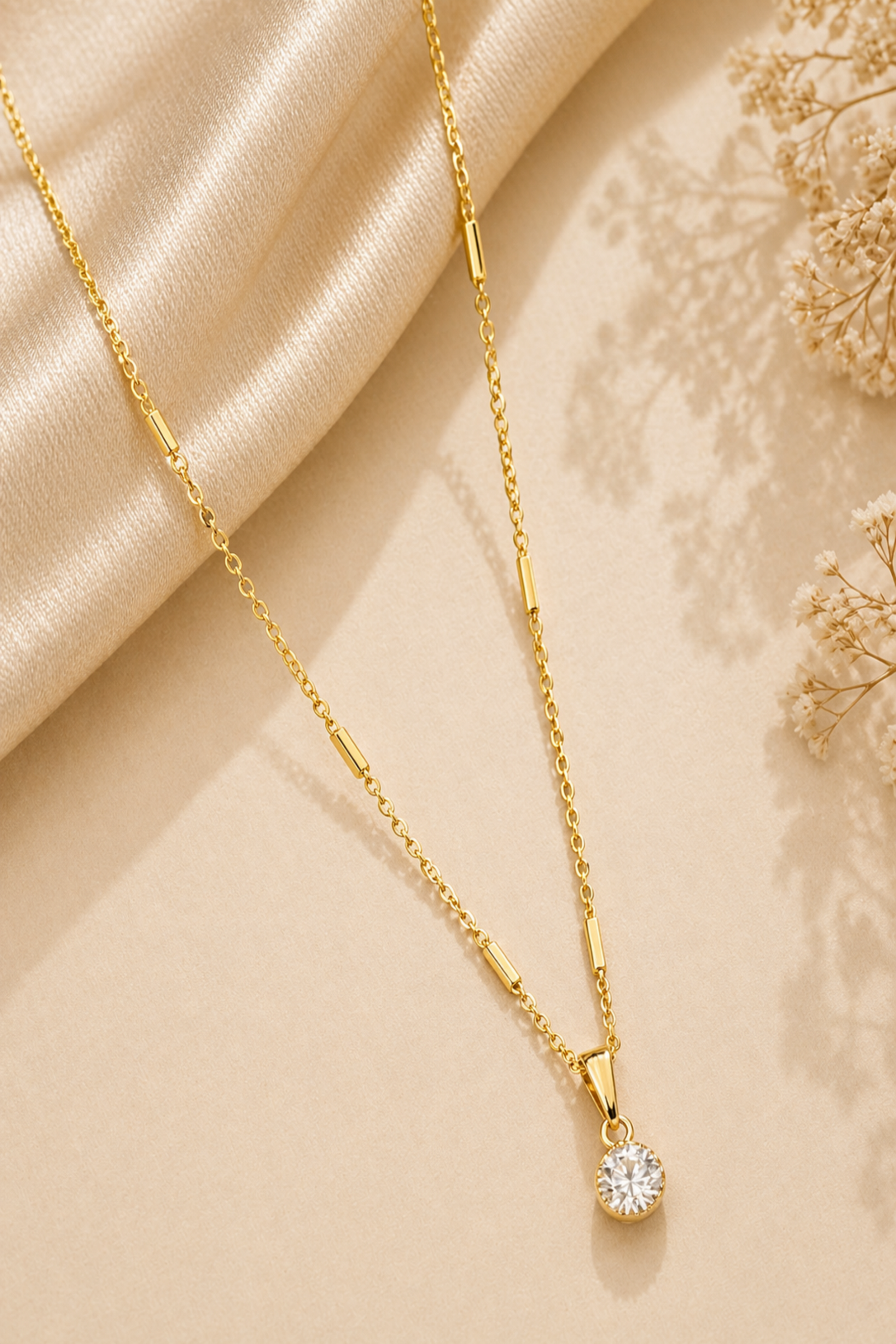 luxury minimal gold jewelry flat lay