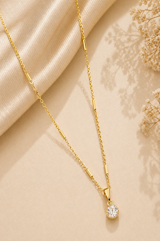 luxury minimal gold jewelry flat lay