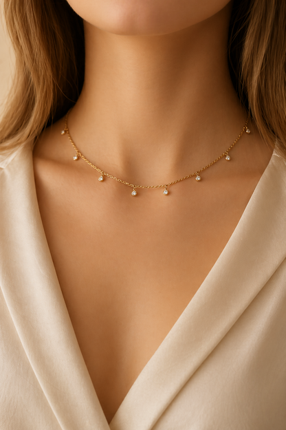 minimal gold chain necklace on model
