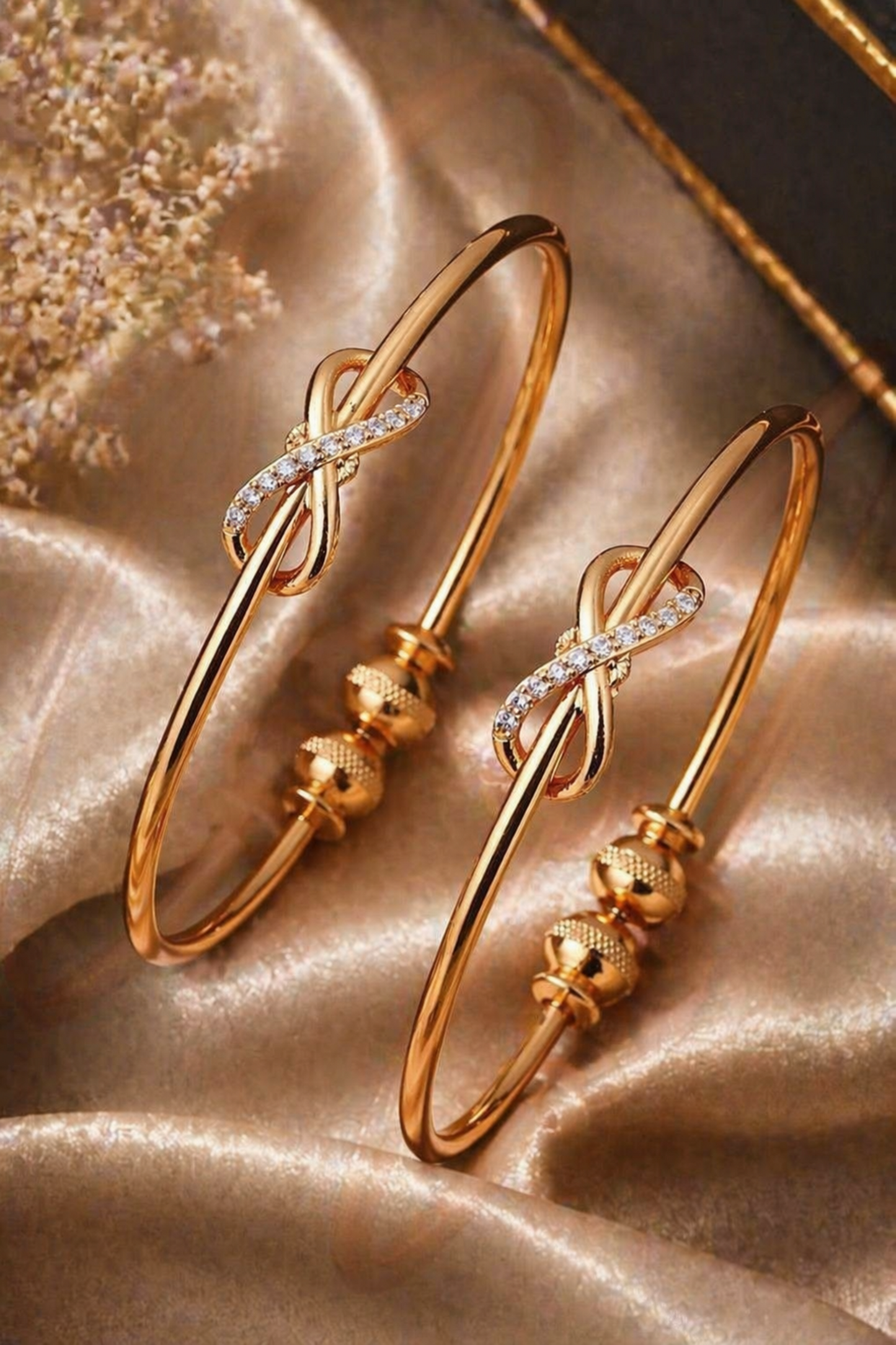 slim gold tone bangle with textured bead ends