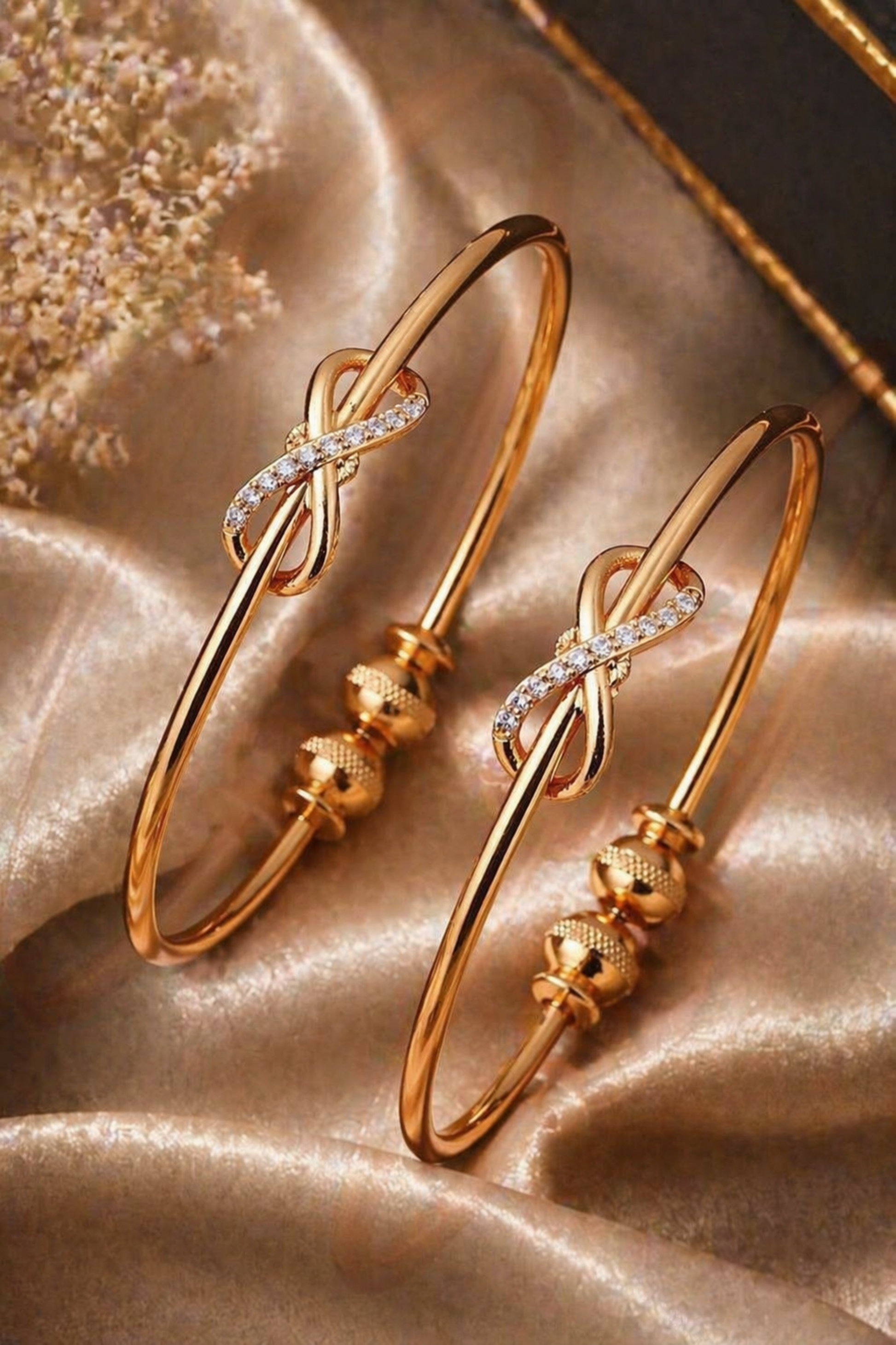 slim gold tone bangle with textured bead ends