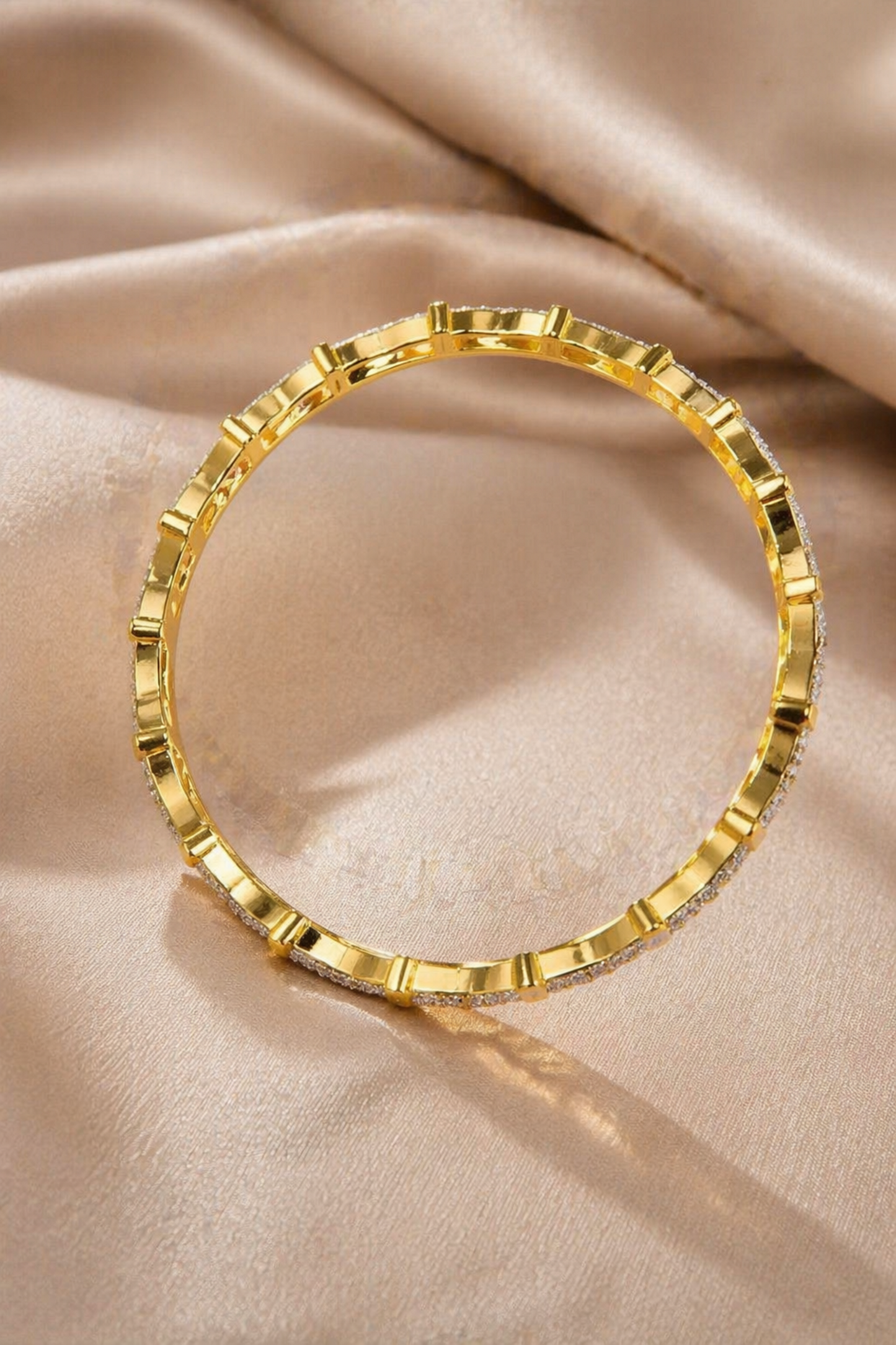 minimal structured gold bangle close-up