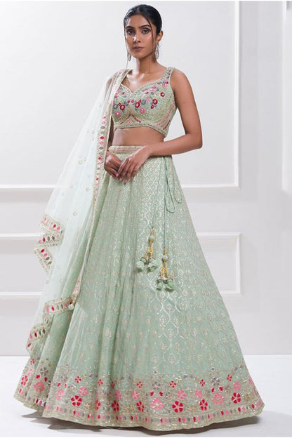 Mint green lehenga choli side profile with sequins work