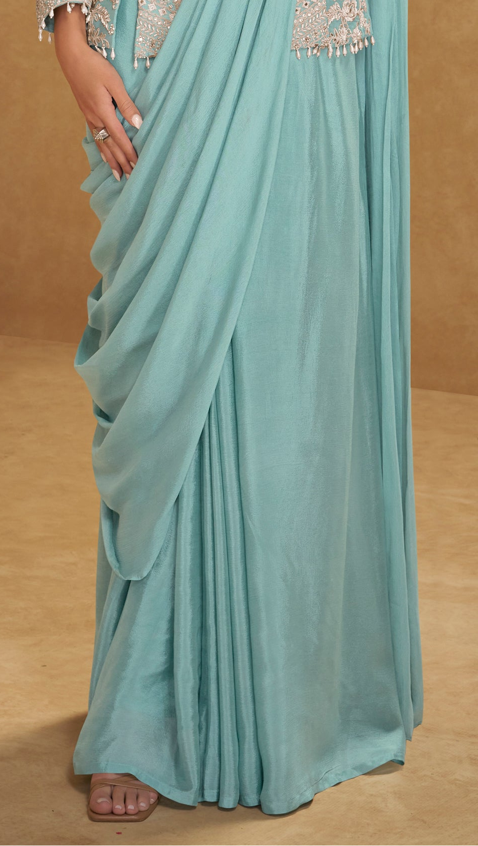 Pallu detail with tassels lace on mint green saree