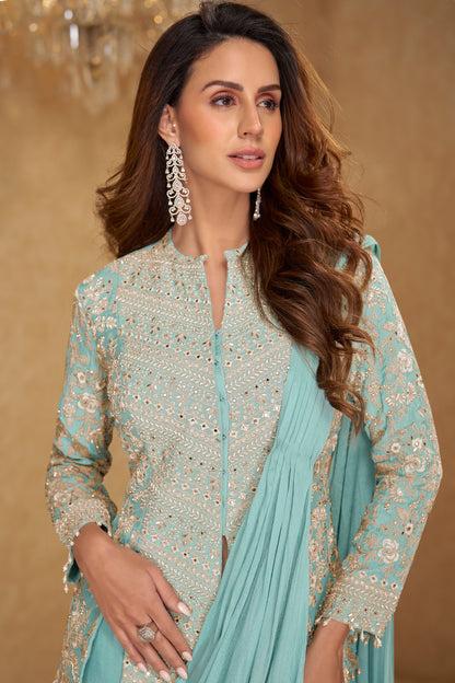 Close-up of embroidery and tassels lace on mint green saree border