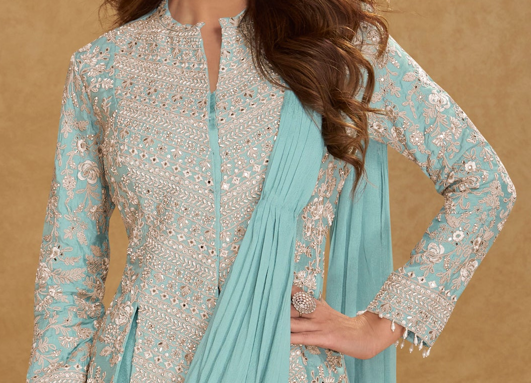Side drape detail of mint green engagement saree