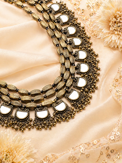 detailed craftsmanship of layered jewelry
