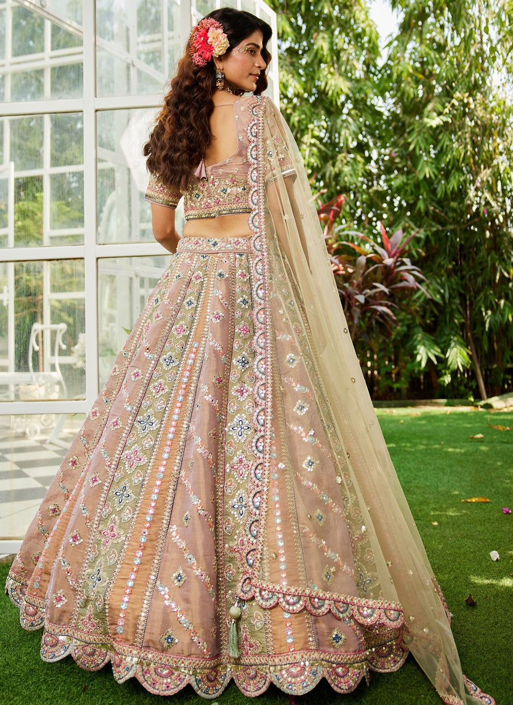 net fabric lehenga choli with heavy embroidery detailing